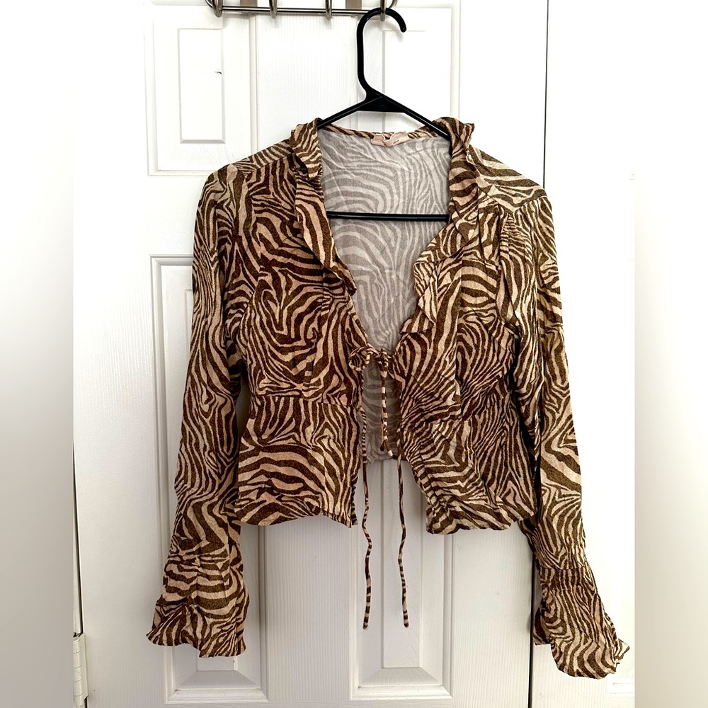 Australian Showpo tie front blouse. Sexy Tiger pattern. Size US6 Small.